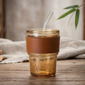 Trendy & Lifestyle Focused (High Conversion) Aesthetic Amber Glass Coffee Mug – Heat-Resistant Tumbler with Protective Leather Sleeve
